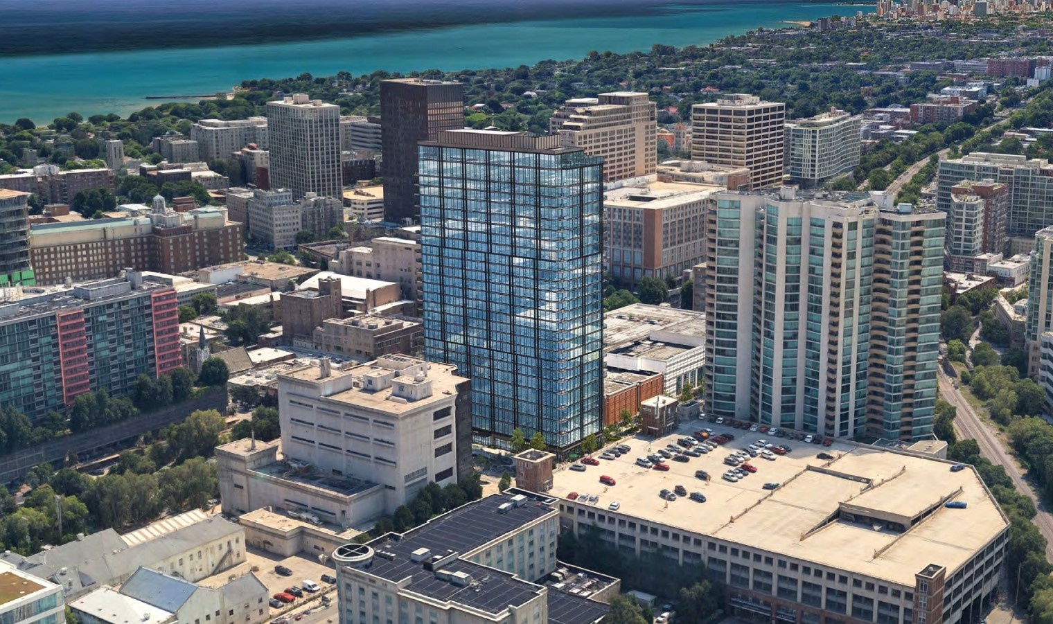 A rendering showing the proposed mixed use tower in its context at Clark and Church. The tower is predominantly glass and 27 stories tall. 
